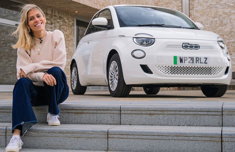 Nicki Shields with a white Fiat 500e